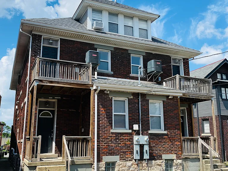 Parking Lot and Balcony off of Bedroom 3