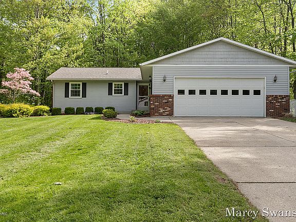 3rd image of 11488 Woodgate Dr NW