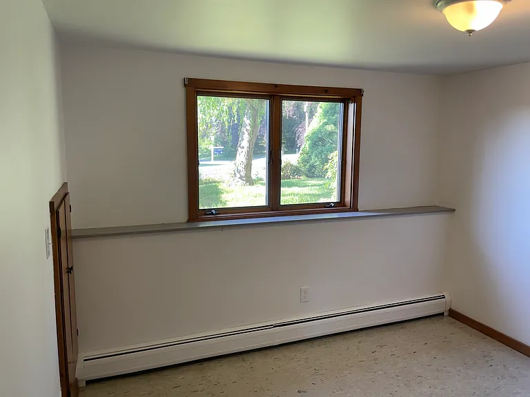 Bedroom downstairs, new paint and electrical.