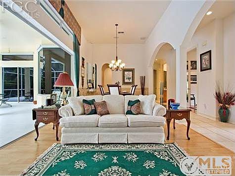Lanai, Formal Living Room and Dining Room are shown with the Arched Pass Hall