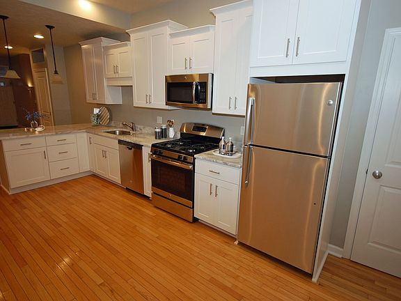 Kitchen - newly renovated with granite counters and stainless steel appliances