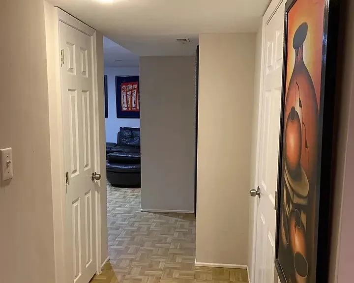 basement hallway, laundry closet, small room in the back next to utility room