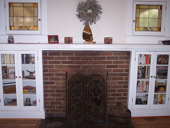 Original 1925 fireplace, stained-glass windows 