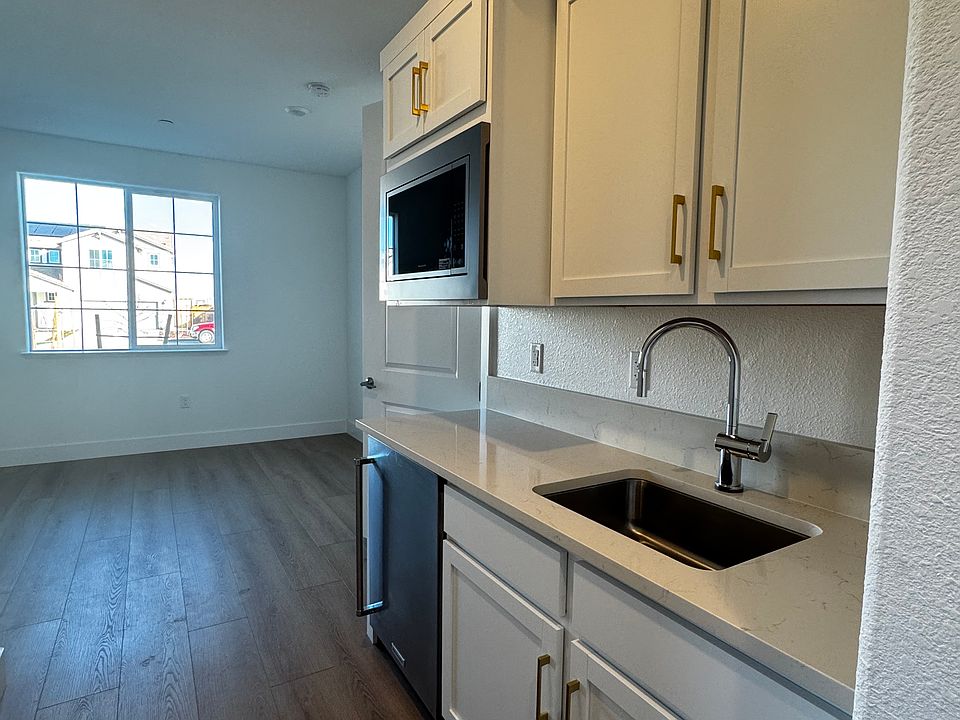 View of Kitchen and Living room from bedroom entrance
