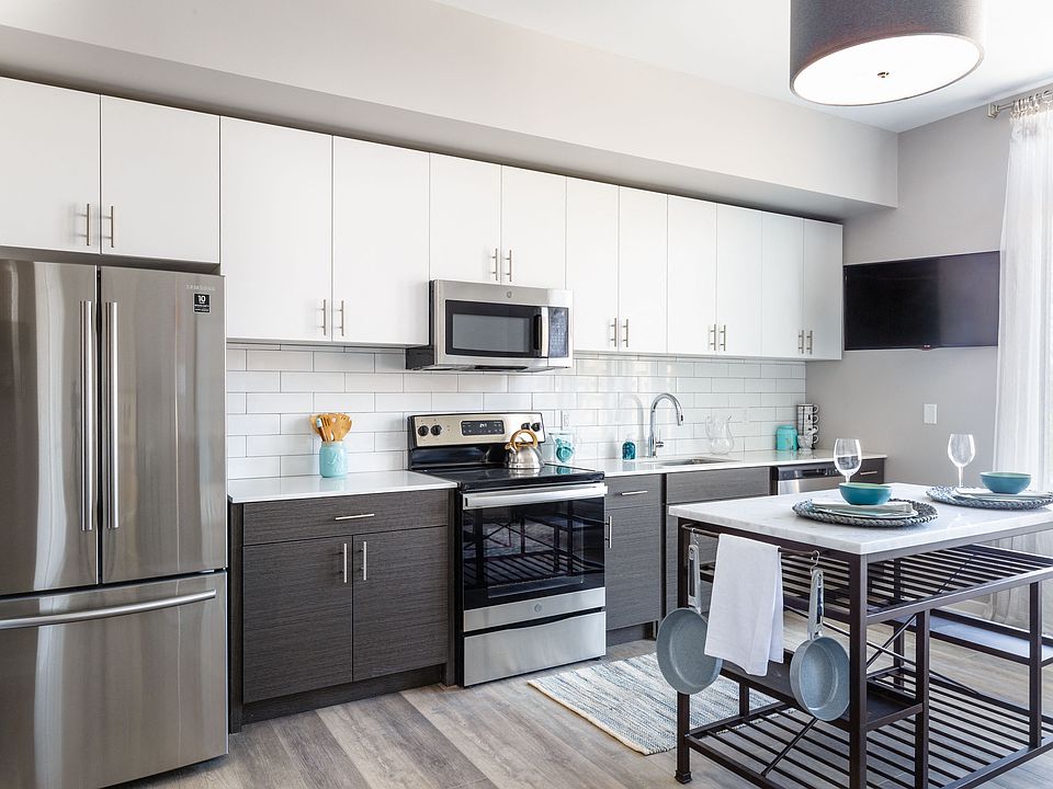 Stainless Steel Appliances and Tile Backsplash