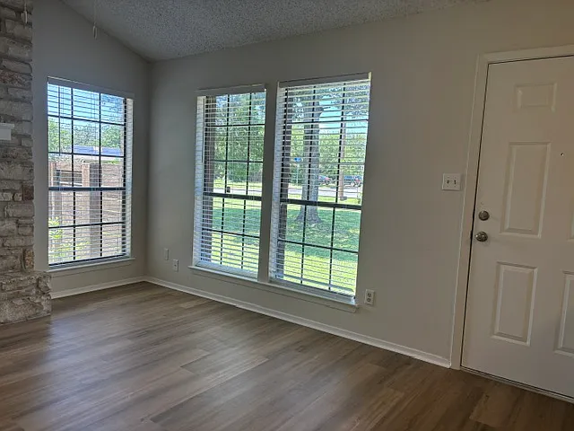 Main entry door and windows out the front of Unit B.