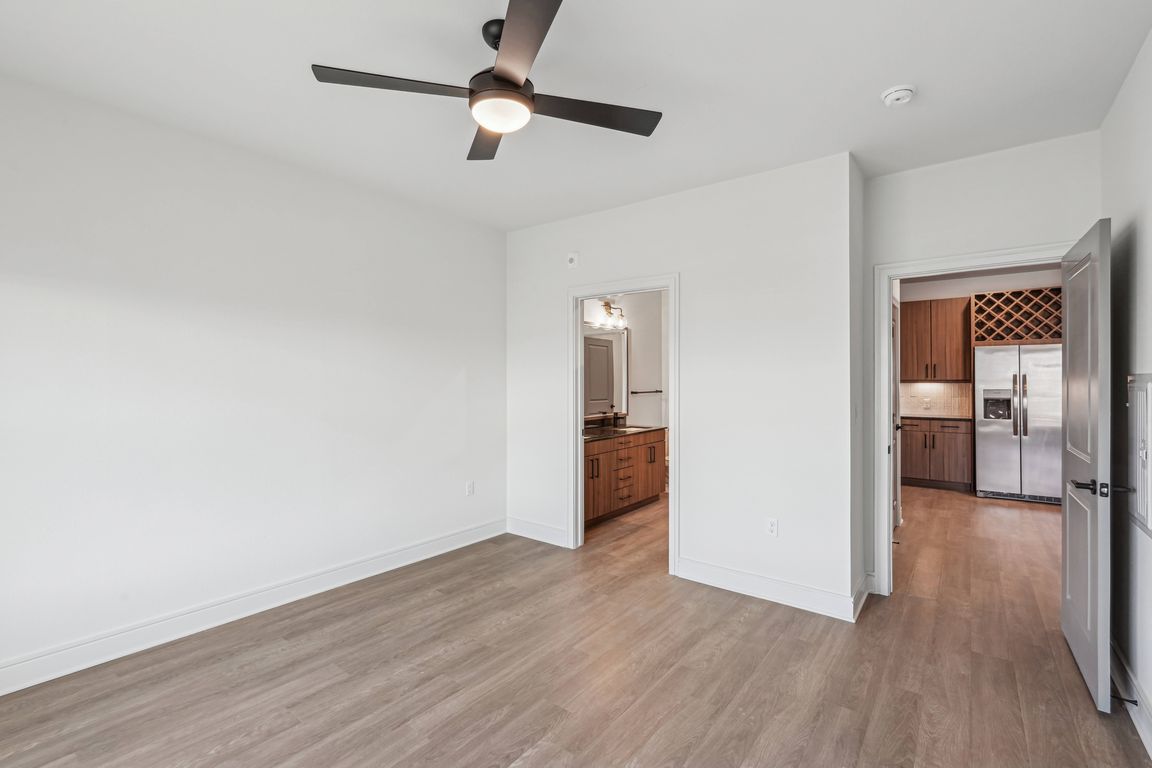 Large Bedroom with Window and Bathroom Access