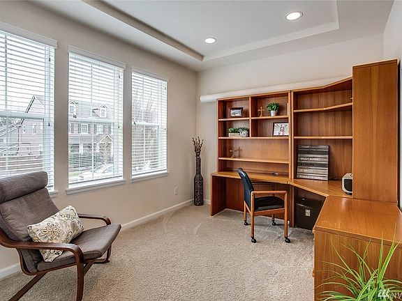 Handsome main floor den which could be a 5th bedroom