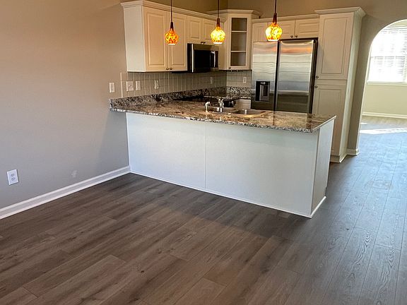 New flooring, appliances, canned lighting