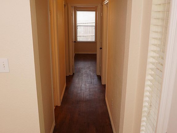 Hallway to secondary bedrooms and bathroom