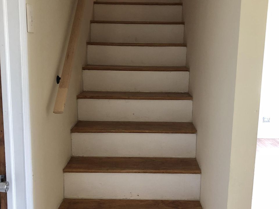 Stairs to a cozy room upstairs