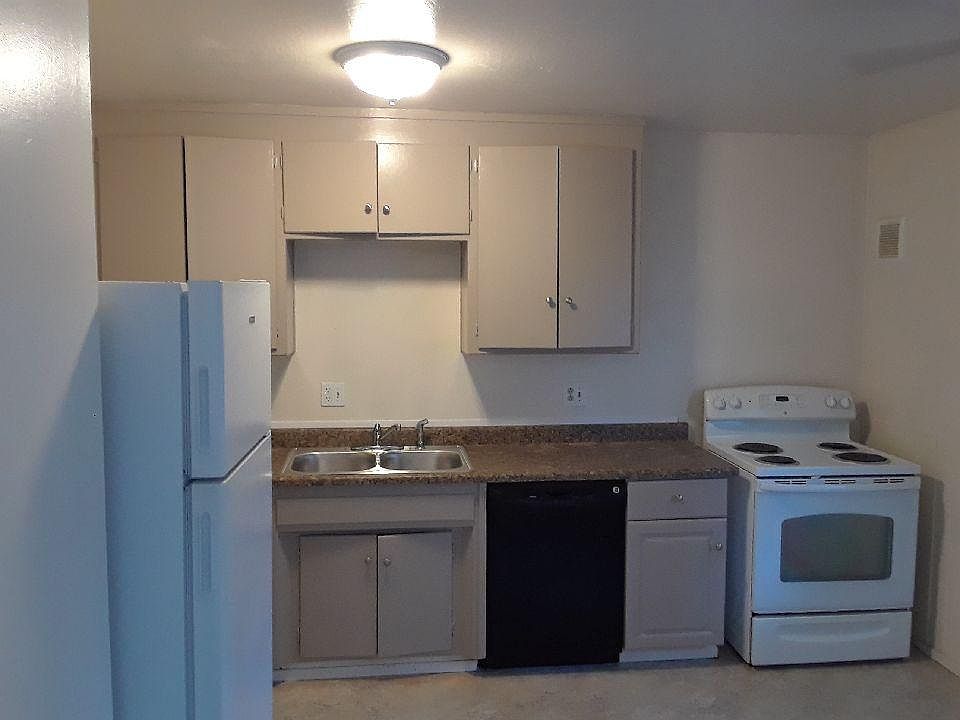 Self cleaning range, new countertop and sink, dishwasher