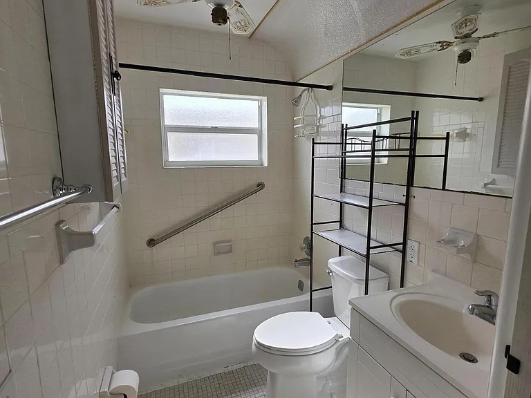 7195 NW 9th Ct — Photo 15