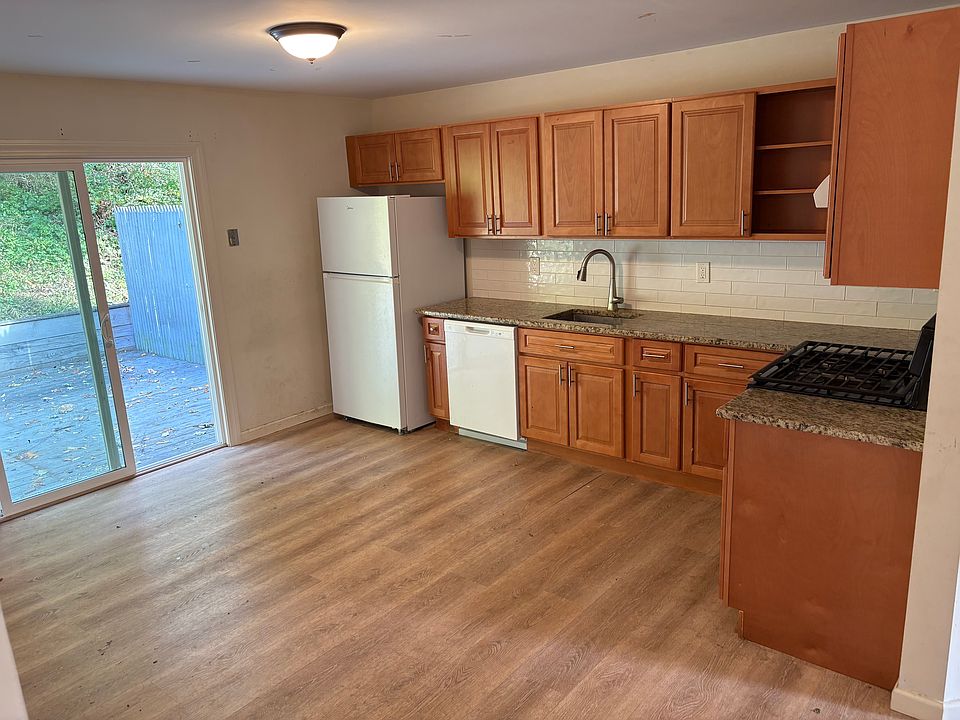 kitchen with patio door leading to back private deck
