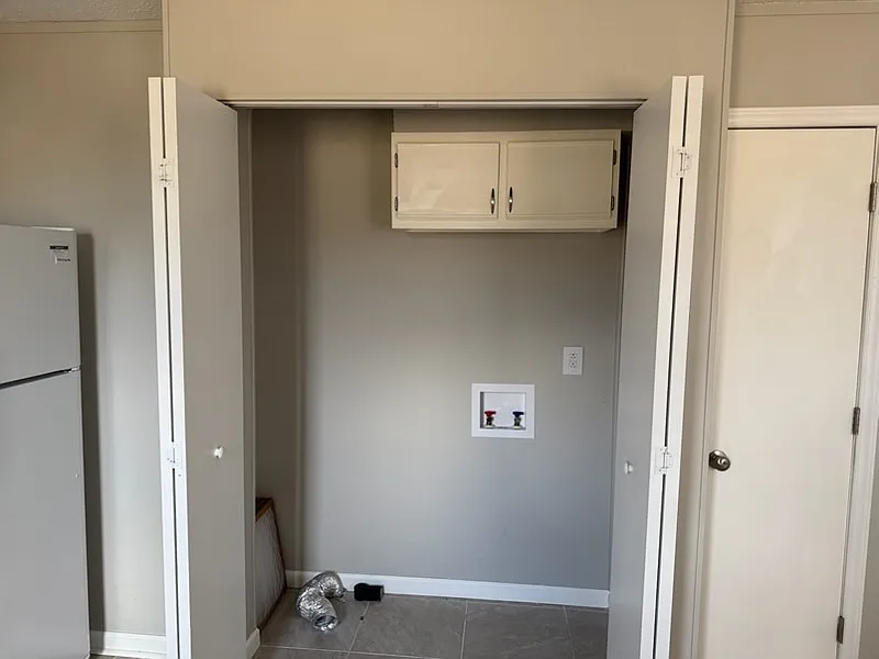 Laundry closet in kitchen