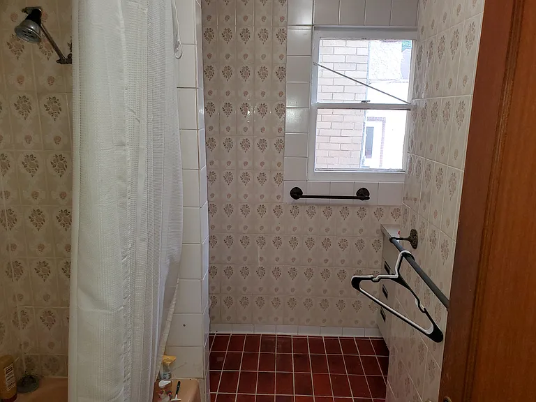 Master bathroom has original vintage tile.