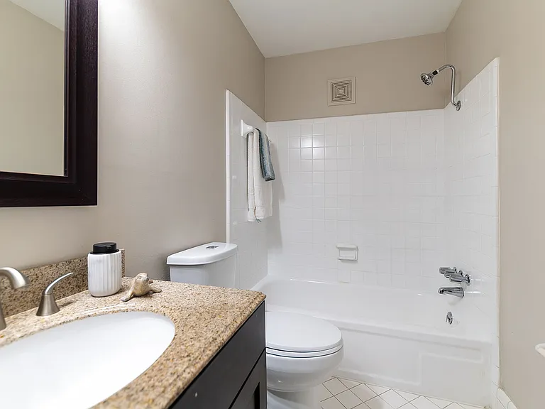 Experience relaxation in this elegant bathroom designed for style and comfort.