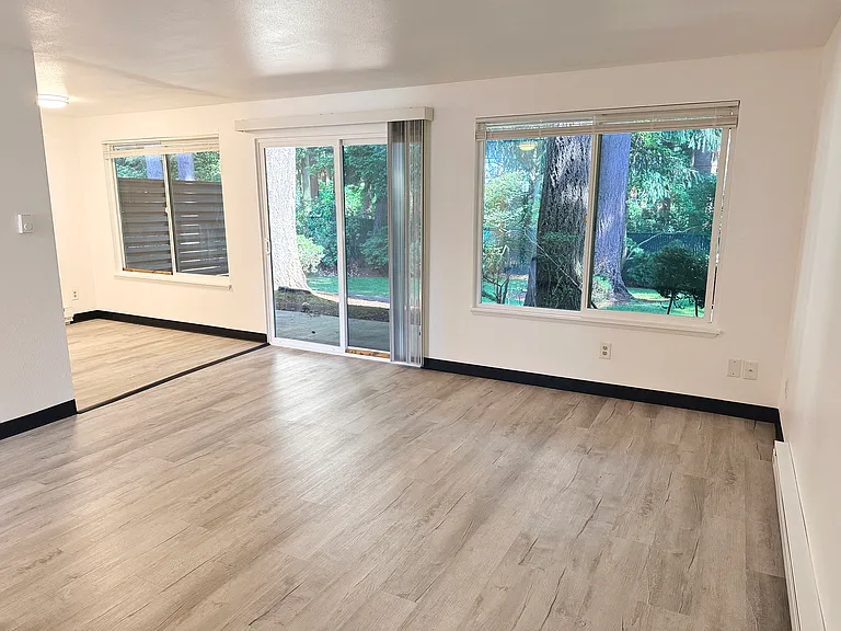 The living room connects to the dining room.