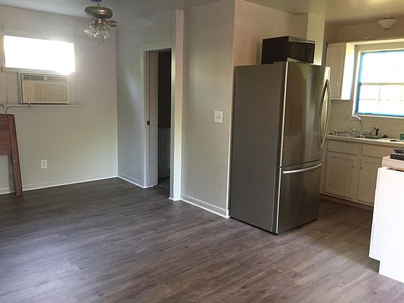Door to bathroom, next to studio kitchen