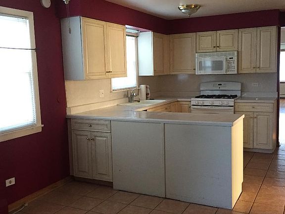 This isn't the exact kitchen but this gives an idea of the size and layout. Walls will be a neutral, off white and will be washable.