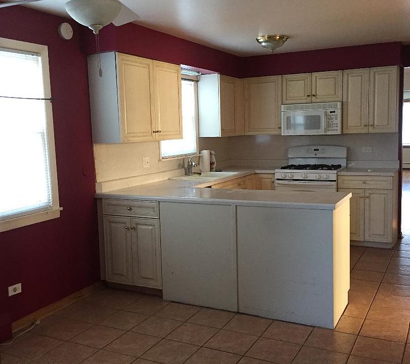 This isn't the exact kitchen but this gives an idea of the size and layout. Walls will be a neutral, off white and will be washable.