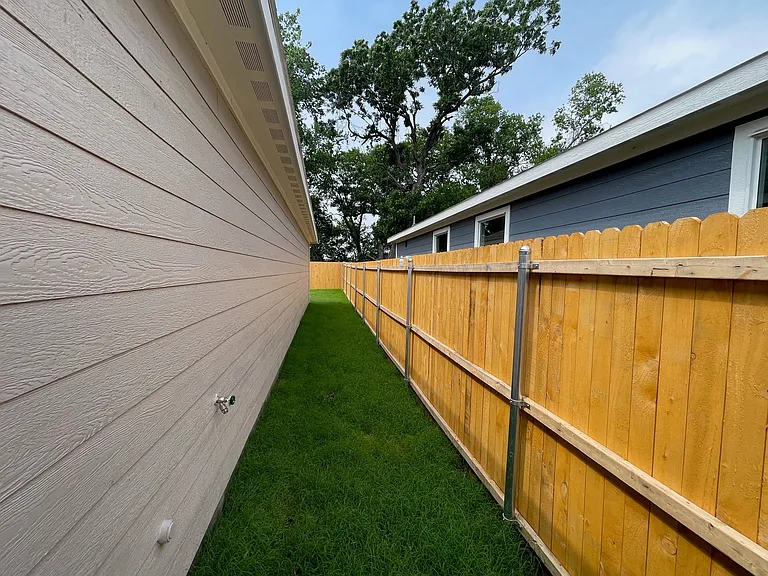 View from side entry door looking toward the backyard