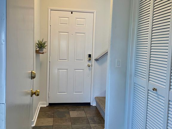 front door and washer dryer area