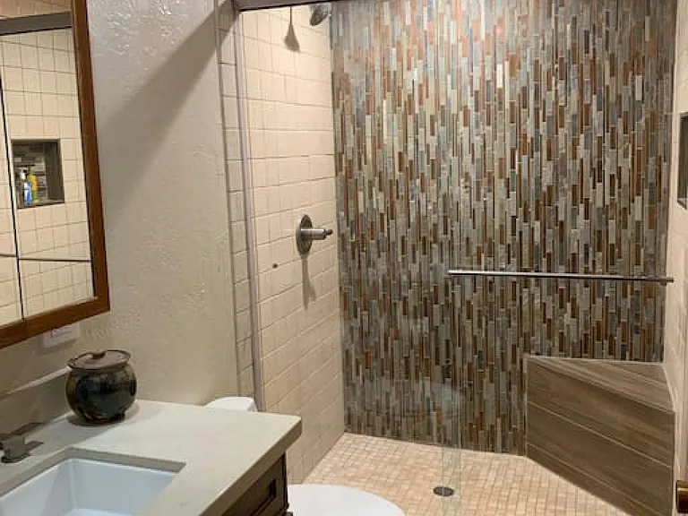 Downstairs bathroom with walk in shower