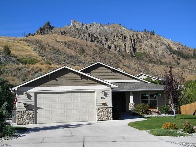 Front of House with Saddle Rock in dropback