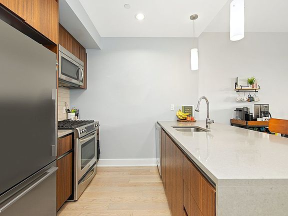 5th image of 5-27 51st Ave Unit 2B