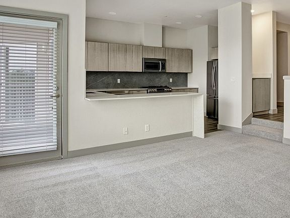The Hillside One Bedroom Plus Den Shown in Beachwood Finish