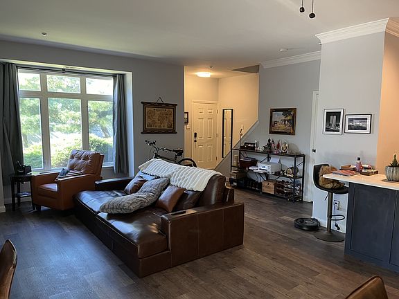 Great room with large bay windows with lots of sunlight