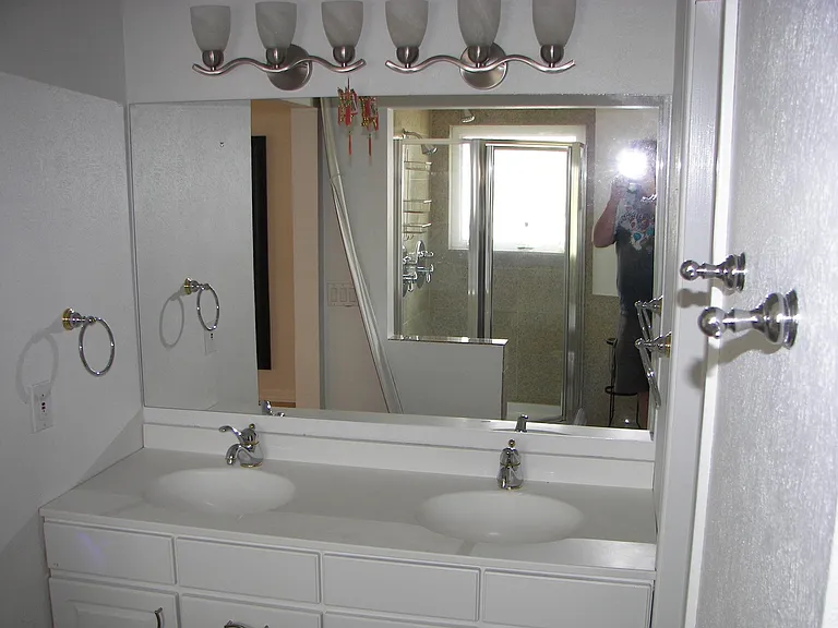 Master Bath, separate dual sink, walk-in closet to right in