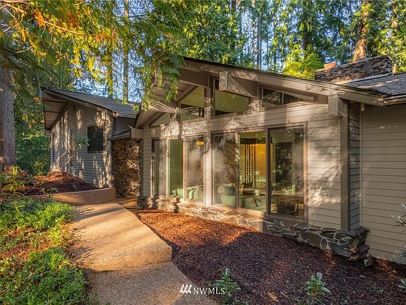 Sleek and Contemporary NW Mid Century Modern Architecture in the woods.
