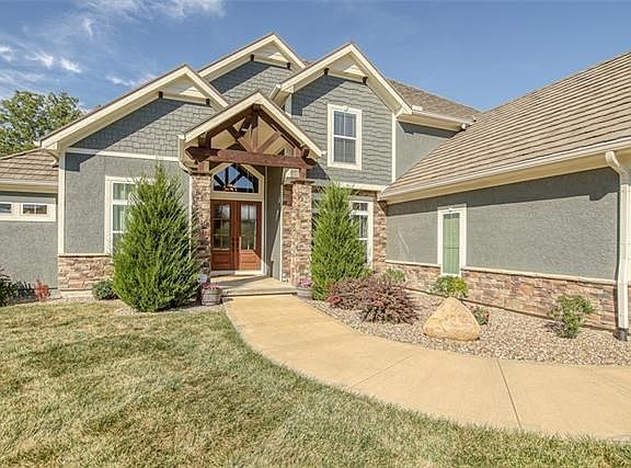 5th image of 6220 NW Saddle Club Ct