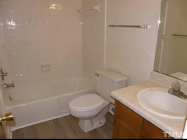 one full bath in hallway and one in suite full bathroom