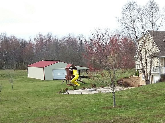 side view showing barn