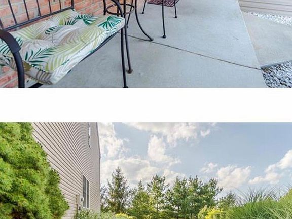 End unit. Paved walkway, paver patio, private lot, lush greenery and landscaping. Lawn service included.