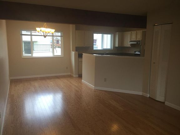 Open living room/dining room attached to kitchen
