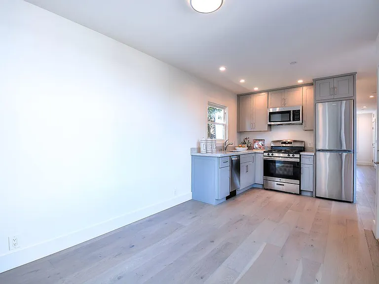Newer Stainless Steel Appliances
White Oak Flooring