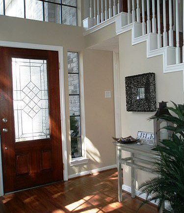 Walk in front hall closet with amazing storage