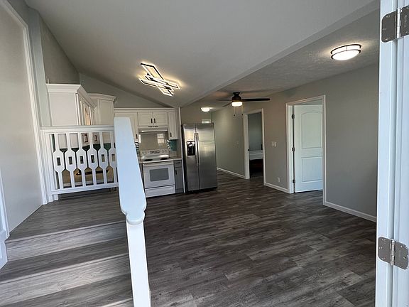 Living room / kitchen entry. Stairs go to the main unit, but have been insulated and sealed off.