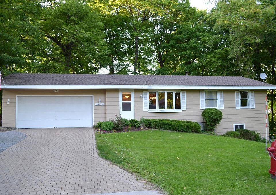 Home rests on a large wooded lot at the end of Hampton Road. Paver stones for the driveway came from the new stadium downtown.
