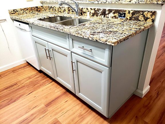 Granite slab counters, newer sink & faucet