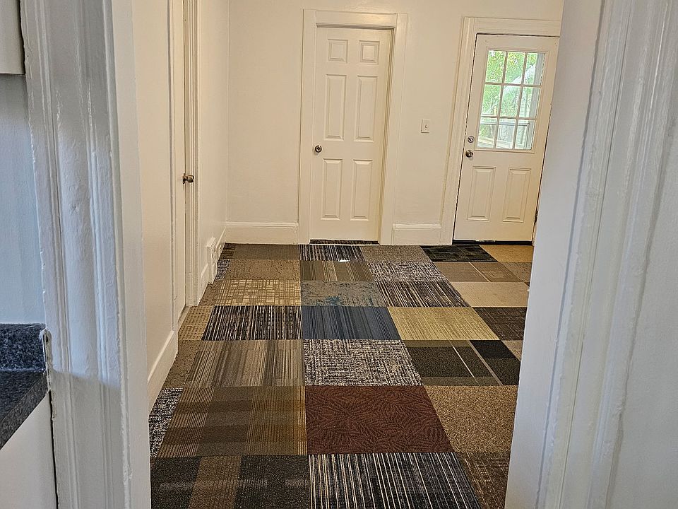 Living space view of master bedroom door and your front door.