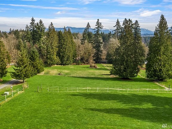 Fenced pastures and Cascade views