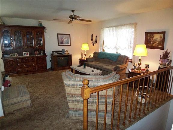 The living room invites you to sit and visit!