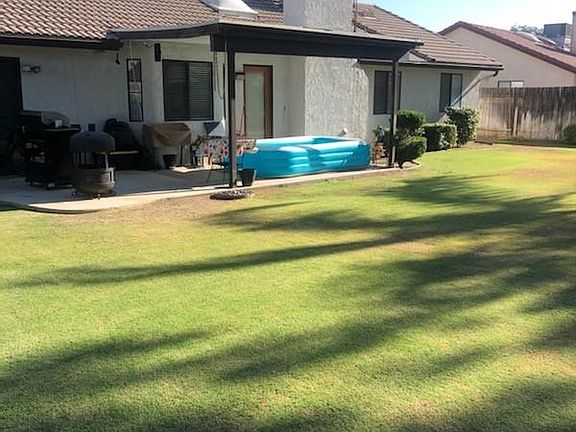 Backyard view, covered patio.