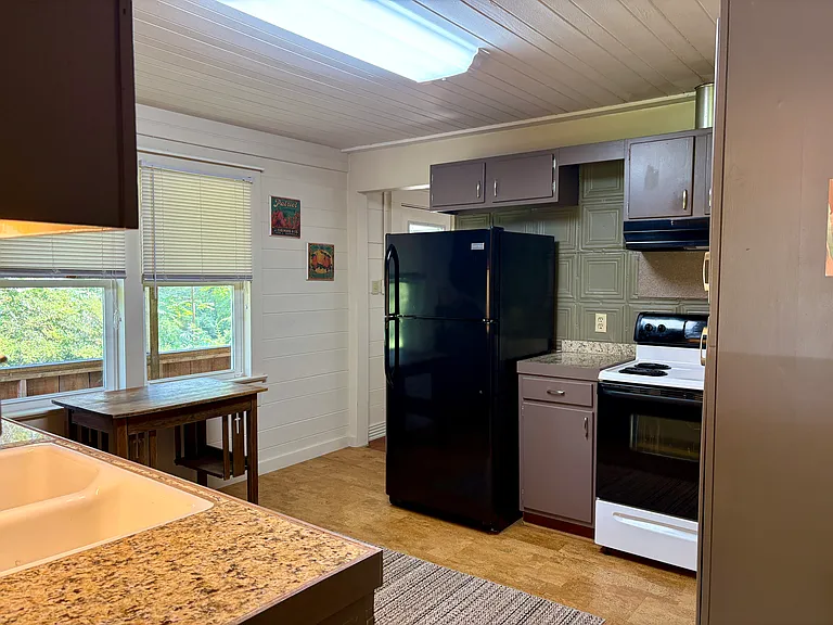 Kitchen from entry, looking toward Living Room