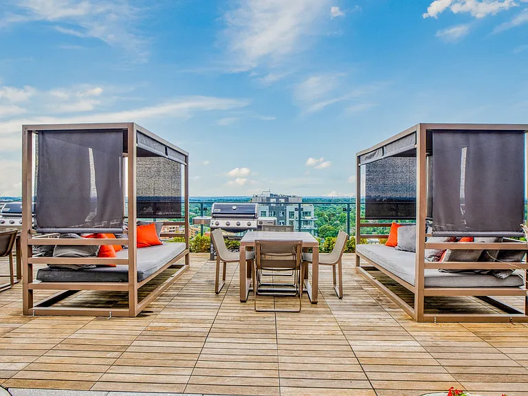Cabanas and ample seating by the pool perfect for getting some shade